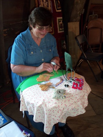Susie was on the floor of the ole mill demonstrating Bobbin Lace with samples of both bobbin lace and tatting so people could see the difference.